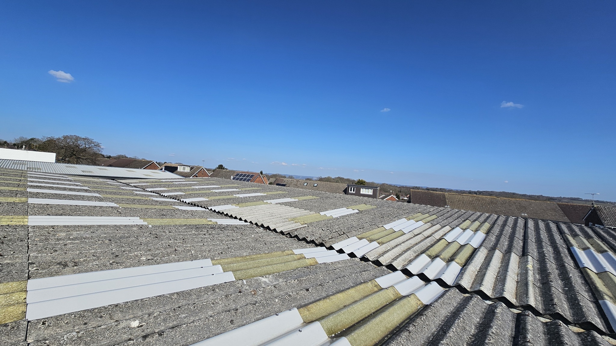 Repairs to a pitched roof with rooflights to a Warehouse roof in East Grinstead, West Sussex