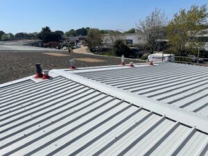 over-roofing to an office and shop roof in Littlehampton, West Sussex
