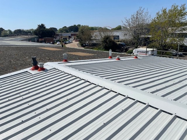 over-roofing to an office and shop roof in Littlehampton, West Sussex