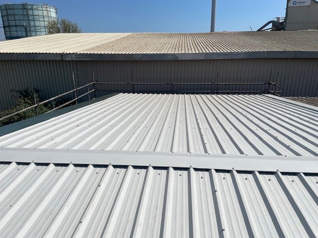 over-roofing to an office and shop roof in Littlehampton
