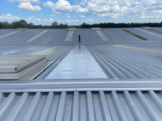 roofing repairs to a warehouse roof in Basingstoke, Hampshire