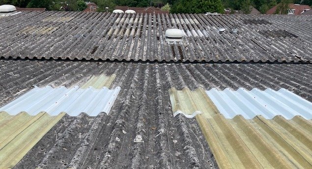 work to a warehouse roof in Bookham Surrey