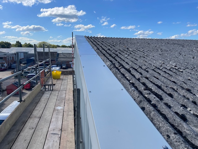 Flashing repairs work to a warehouse in Totton, Southampton, Hampshire.