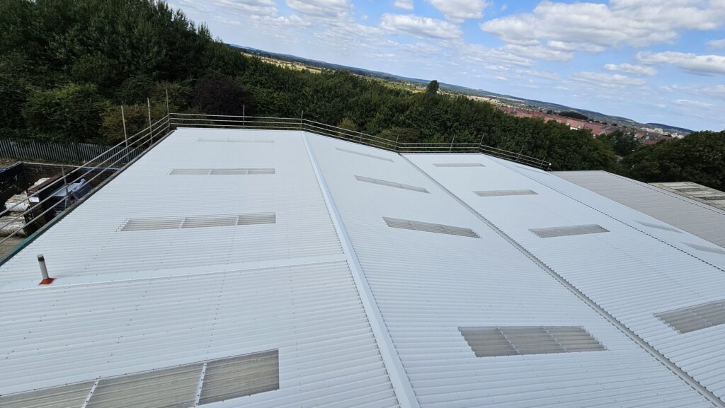 Over-roofing to a leaking warehouse and office roof in Littlehampton, West Sussex