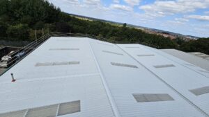 Over-roofing to a leaking warehouse and office roof in Littlehampton, West Sussex