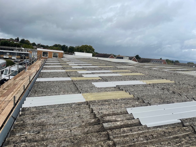 Warehouse roof in East Grinstead, West Sussex leaking below rooflights