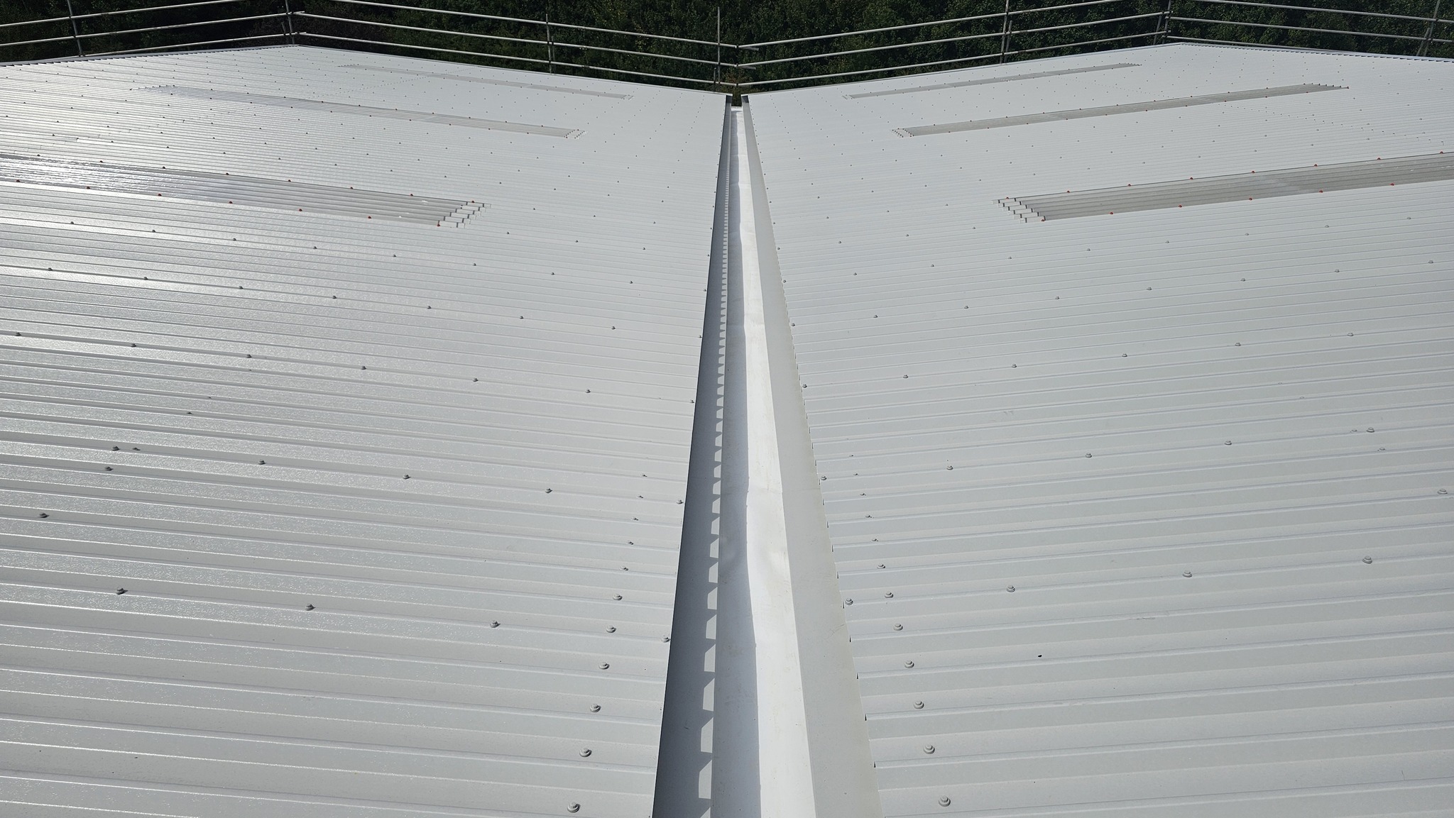 Over-roofing to a leaking warehouse and office roof in West Sussex