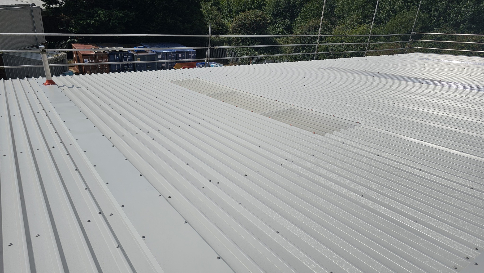 Over-roofing to a leaking warehouse and warehouse roof in Littlehampton, West Sussex