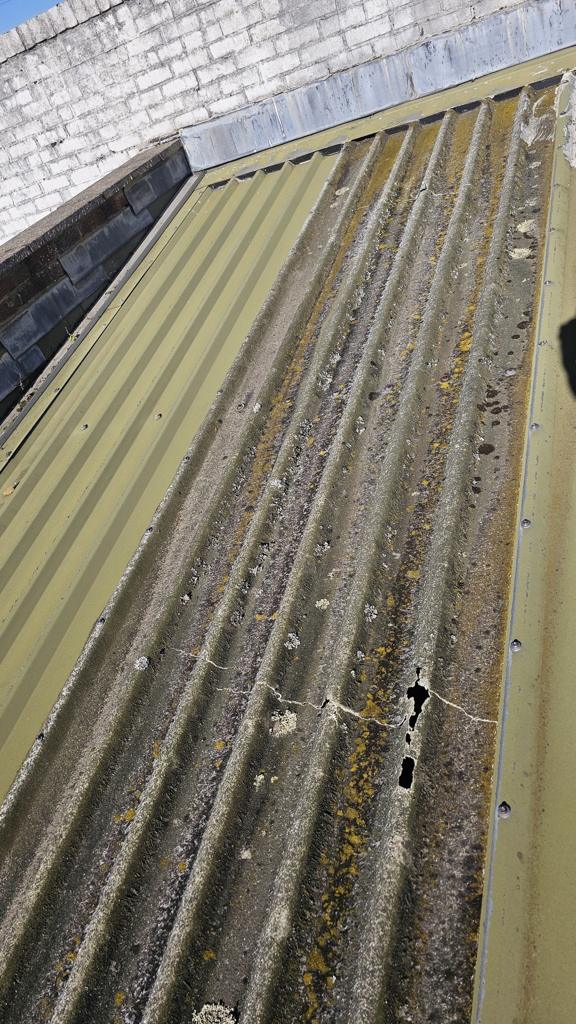 Warehouse roof Roof repairs to a roof in Hastings, East Sussex
