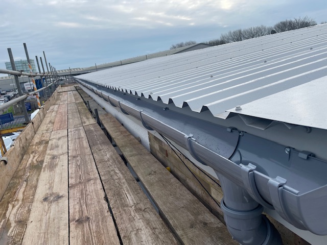 Over-roofing project for a warehouse and factory roof in Littlehampton, West Sussex