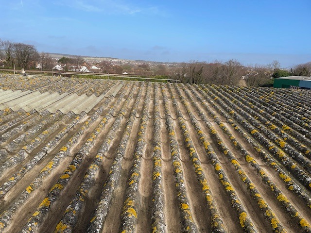 Roof Repairs and moss removal on a Warehouse roof in Southwick, Sussex