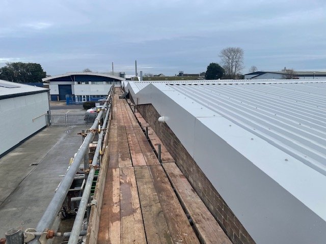 Over-roofing for a factory roof in Littlehampton, West Sussex