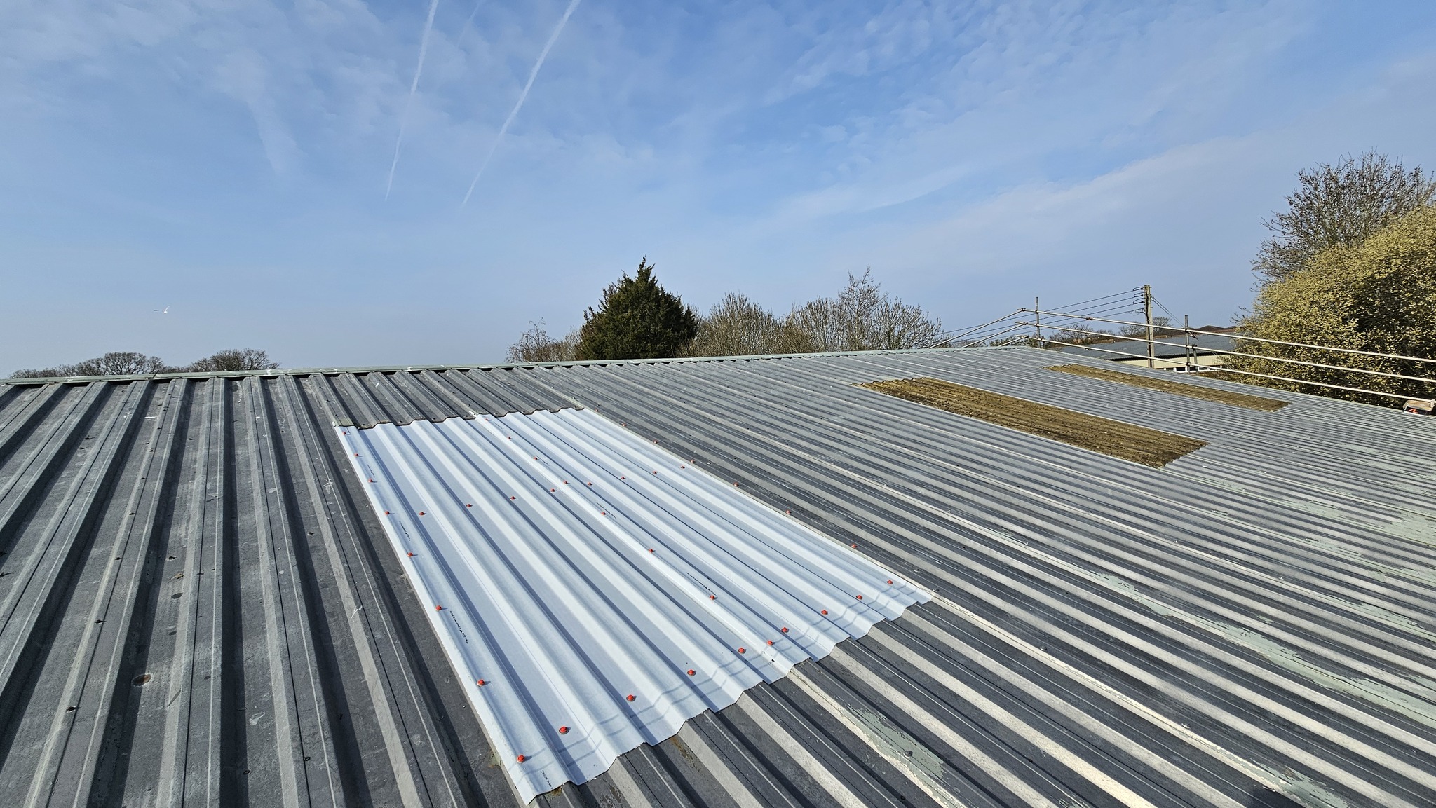Roof repairs to a warehouse roof in Kingsnorth, Ashford, Kent